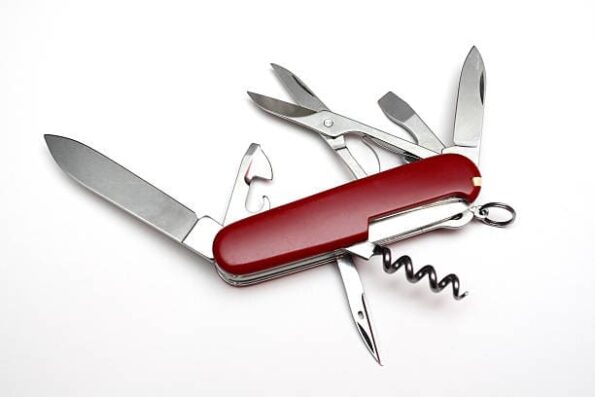 a red pocket knife with many tools